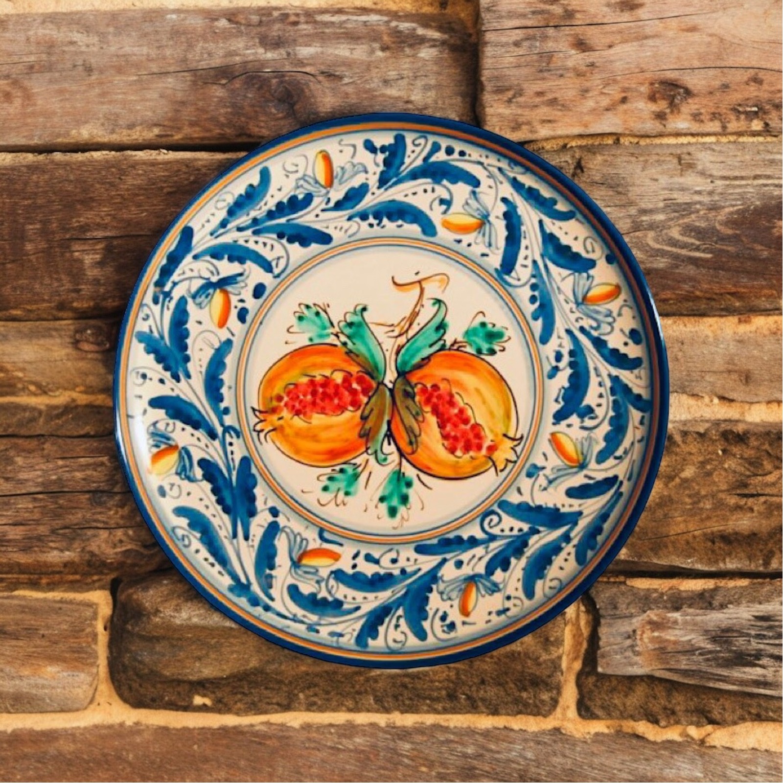 Piatto decoro '600 melograni in ceramica di Caltagirone